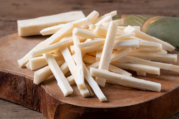 Sliced Raw Bamboo shoot on cutting board background