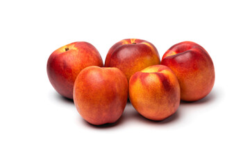 fresh juicy nectarines on a white background