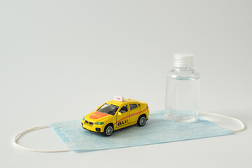 Kirov, Russia - 12 September 2020 There is a miniature taxi and antiseptic. Delivery and...