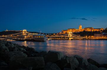 The famous Chain bridge with the castle in the background at night, Budapest, Hungary