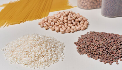 Rice, lentils, chickpeas and pasta. Basic carbohydrates in a balanced and healthy diet.