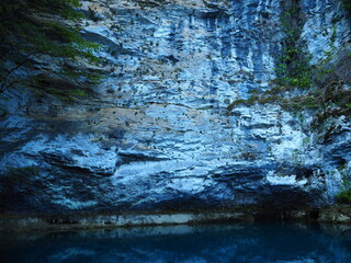 Blue lake among the rocks in Abkhazia