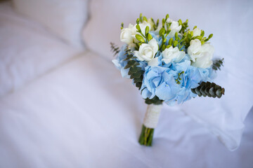 beautiful wedding bouquet of blue and white hydrangeas