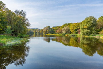 Colorful tree branches with bright foliage in golden autumn season