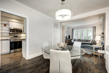 Beautiful renovated townhouse in a row with bathroom, bedrooms, new kitchen, new floors, all white painted, finished basement