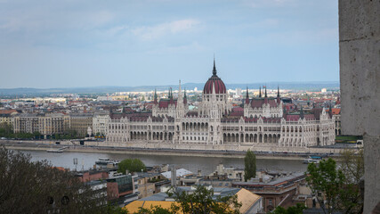 Fototapeta premium Budapest city skyline with the Hungarian Parliament and Danube River on a cloudy day, Budapest, Hungary