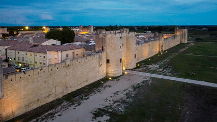 Fototapeta na wymiar Aerial view of Aigues Mortes, a medieval city surrounded with salt marshes in Camargue, south of France - Fortified town center near the Mediterranean Sea