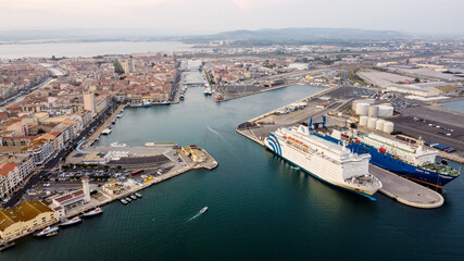 Fototapeta premium Aerial view of the industrial harbor of Sete in the South of France - Passenger ferry to Morocco