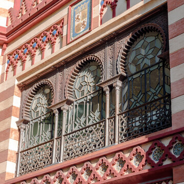  moorish style window-
detail of a facace in moorish style. seville. spain