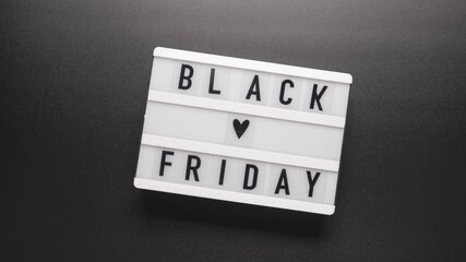 Stop motion. Black friday sale word on lightbox.