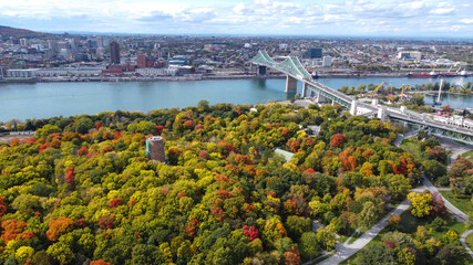 Montreal Jacques Cartier bridge with colourful autumn leaves