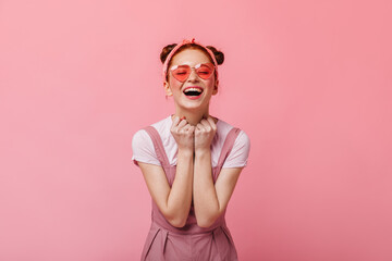 Charming girl in astonishment looks at camera on pink background. Portrait of woman in pink top and white t-shirt - Powered by Adobe
