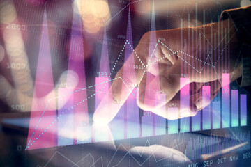 Multi exposure of man's hands holding and using a phone and financial chart drawing. Market analysis concept.