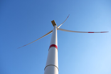 Wind turbines on sky background. Environment and renewable energy. Green energy