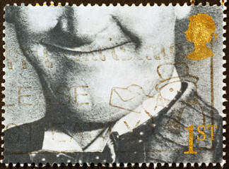 Smile of Stan Laurel on british postage stamp