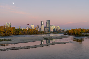 Calgary's skyline along the Bow River in autumn.