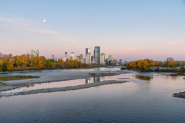 Calgary's skyline along the Bow River in autumn.