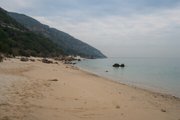 Galapinhos beach in Arrabida park  on a cloudy day, in Portugal