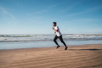 Portrait of an athletic man running.