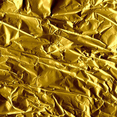 Fototapeta premium Gold shiny wall abstract background. Crumpled luxury metallic foil texture.