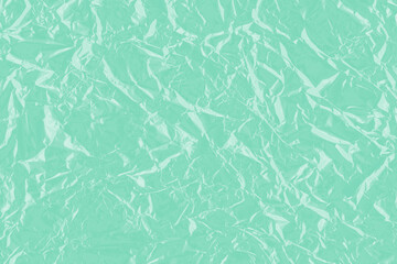 Colorful shiny wrap abstract background. Crumpled plastic texture.