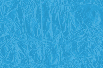 Colorful shiny wrap abstract background. Crumpled plastic texture.