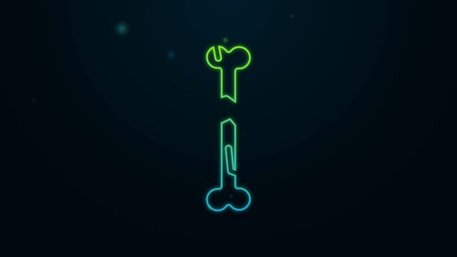 Glowing neon line Human broken bone icon isolated on black background. 4K Video motion graphic animation