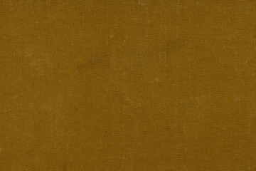 Vintage and old looking paper background. Colored gold with a brown retro book cover. Ancient book page.