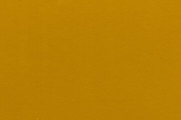 Fototapeta premium Vintage and old looking paper background. Colored gold with a brown retro book cover. Ancient book page.