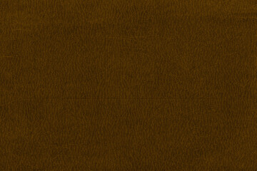 Vintage and old looking paper background. Colored gold with a brown retro book cover. Ancient book page.