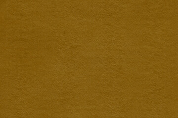 Vintage and old looking paper background. Colored gold with a brown retro book cover. Ancient book page.