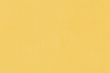 Vintage and old looking paper background. Colored gold with a brown retro book cover. Ancient book page.