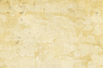 Vintage and old looking paper background. Colored gold with a brown retro book cover. Ancient book page.