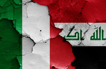 flags of Italy and Iraq painted on cracked wall