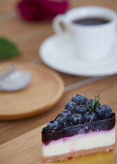 homemade blueberry cheese cake on wood