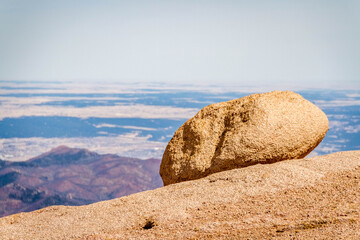 Fototapeta na wymiar rock on mountain top with view