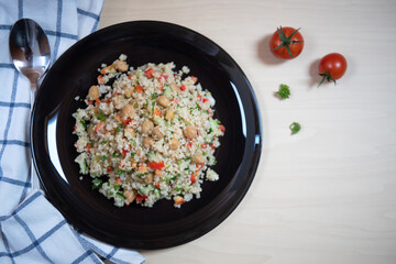 Quinoa salad with on a wooden table.Superfood and healthy eating concept.Top view