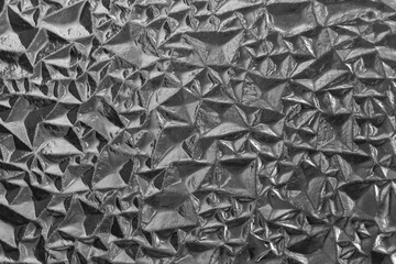 Acrylic crystals with different levels of illumination. Light and shadow texture with angles. Corrugated texture. Textured backgrounds.