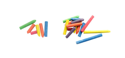 chalks in a variety of colors arranged on a white background © Supatson