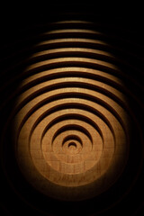 Geometric concentric round beech wood plate wide-angle macro close-up light and shadow effect