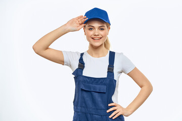 Woman in working uniform blue cap delivery courier delivery service