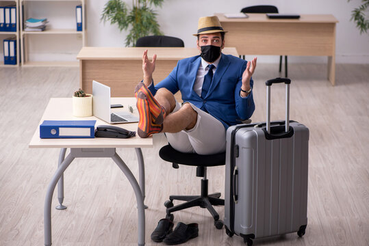 Businessman Preparing For Trip During Pandemic