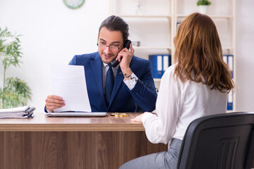 Business meeting between businessman and businesswoman