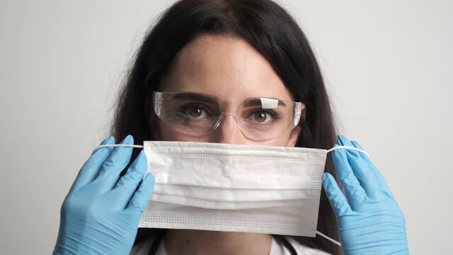 Portrait of a female doctor wearing a protective surgical mask