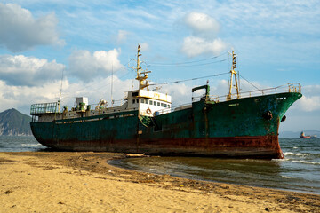 Seascape with a ship stranded. Nakhodka, Russia