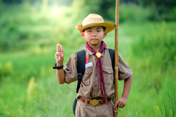 Boy Scout students congratulate Boy Scouts during outdoor event. - obrazy, fototapety, plakaty