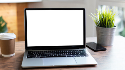 mock up empty screen computer on wood desk in home