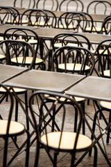 Tables and chairs set up outside a restaurant