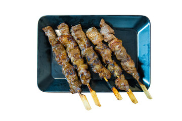 Die cut of Grilled beef on a grilled skewer on white isolated, focus selective.