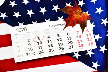 United States of America flag and calendar with date of November 3. Election of the President of the United States. Concept - voting. USA.
